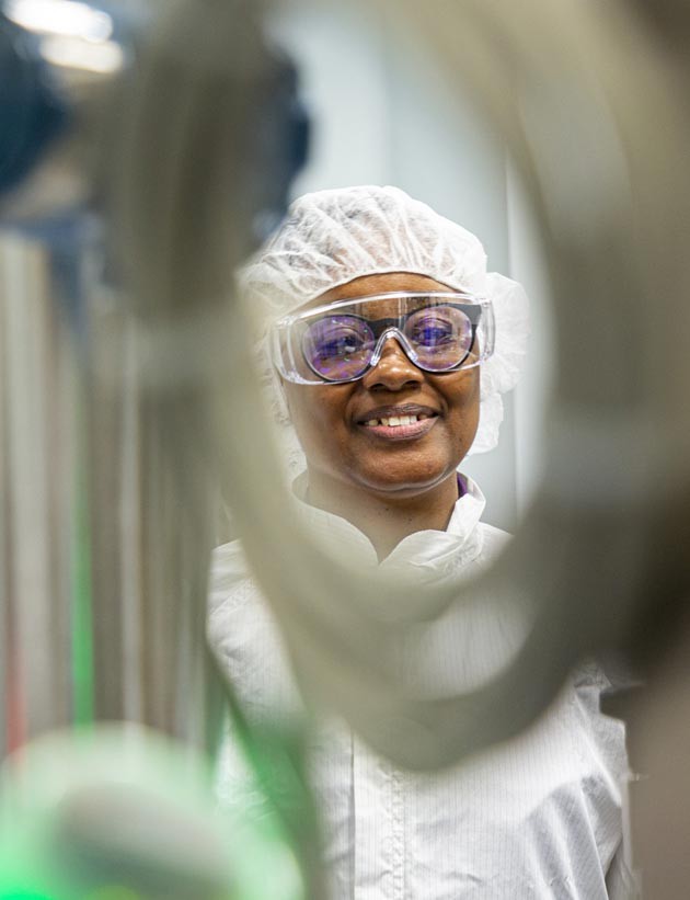 Biogen employee working in a lab